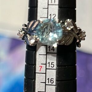 Sterling silver aquamarine and white topaz ring.